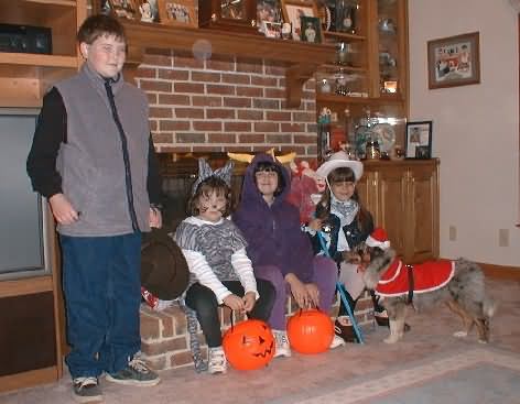 Halloween 2000. Steph the cowgirl and Mason the SantaPaws